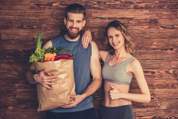 Couple with healthy food - Фото, изображение
