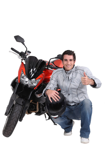 Man with motorbike and helmet - Photo, Image