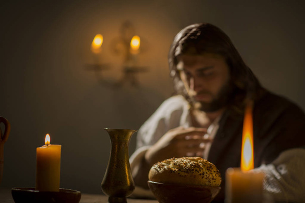 Jesus Christ holding the prayer         - Foto, Imagen