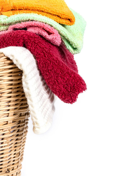 close up color mix  towel in wicker baskets on white background - Photo, Image