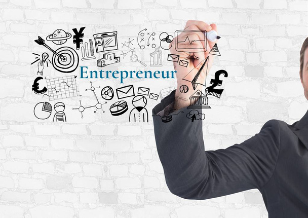 Businessman writing Entrepeneur text with drawings graphics - Φωτογραφία, εικόνα