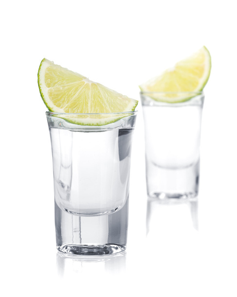 Two shots of vodka and lime slice - Photo, Image