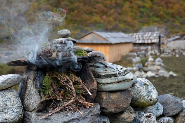 Burning juniper twigs - tibetian ritual tribute to the spirits f - Photo, Image