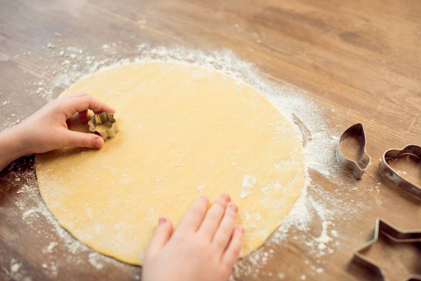 boy making shaped cookies - Photo, Image