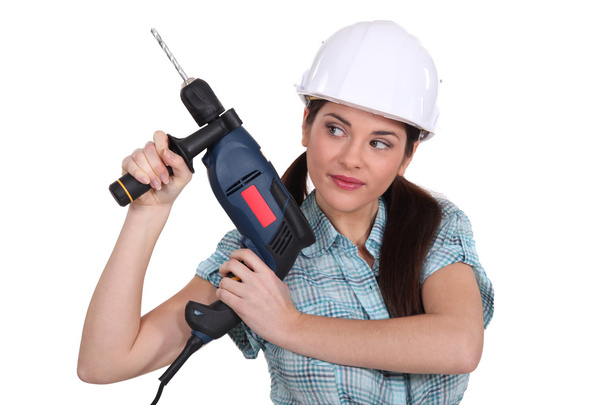 Woman with a power drill - Valokuva, kuva