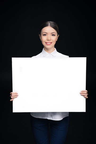 businesswoman holding blank card - Фото, изображение