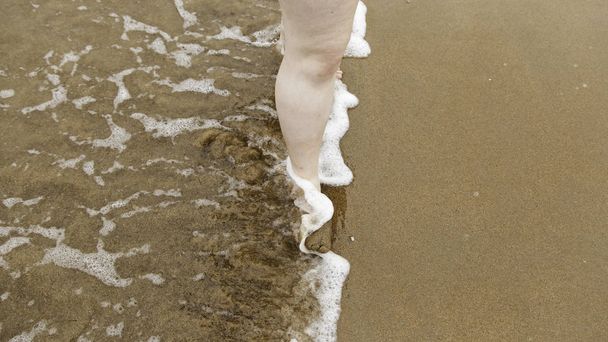 Feet in sea water - Foto, immagini