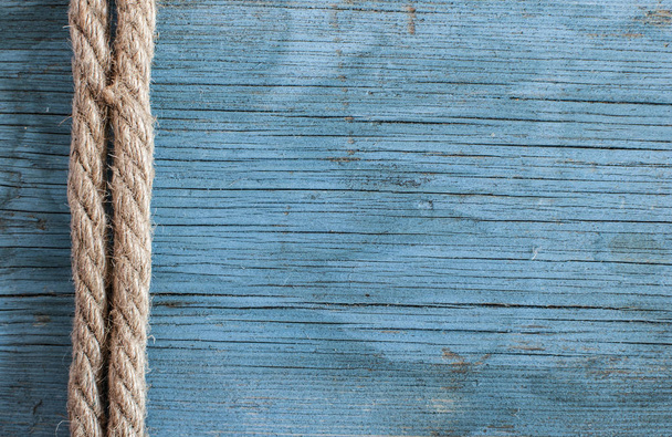 ship rope on wooden background - Foto, Imagen