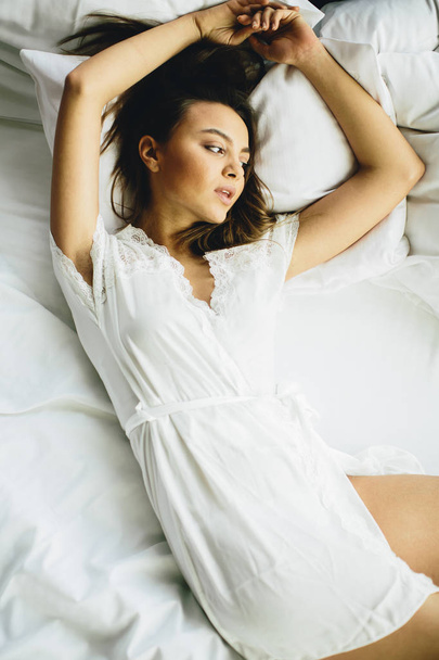 Pretty woman in bed - Fotó, kép
