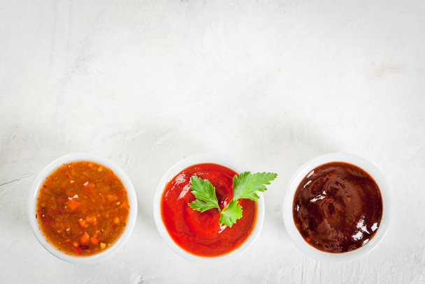 Three kinds of red tomato sauce - Foto, imagen