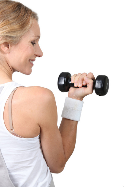 Woman with weights - Foto, afbeelding