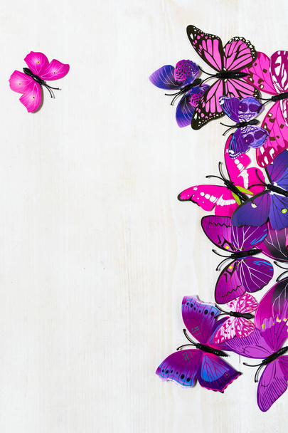 Butterfly decoration on wooden table - Фото, зображення