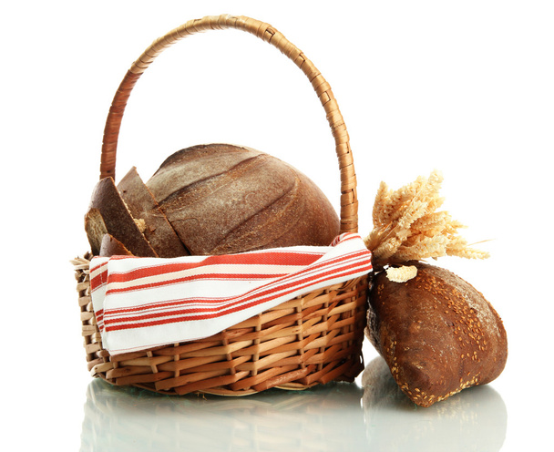 tasty rye breads with ears in basket, isolated on white - Fotografie, Obrázek