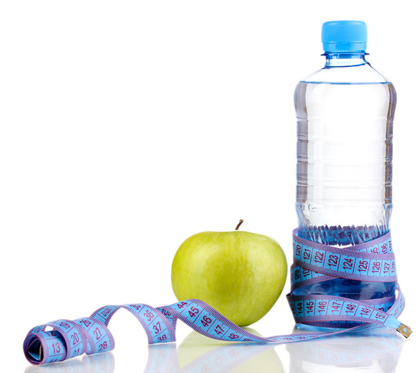 Garrafa de água, maçã e fita métrica isolada em branco
 - Foto, Imagem