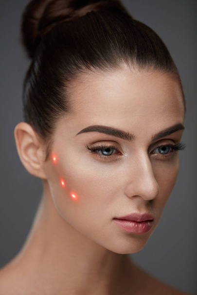 Beautiful Woman With Soft Skin And Red Laser Points On Skin - Fotoğraf, Görsel
