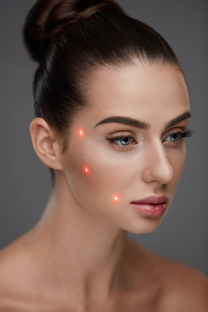 Beautiful Woman With Soft Skin And Red Laser Points On Skin - Valokuva, kuva