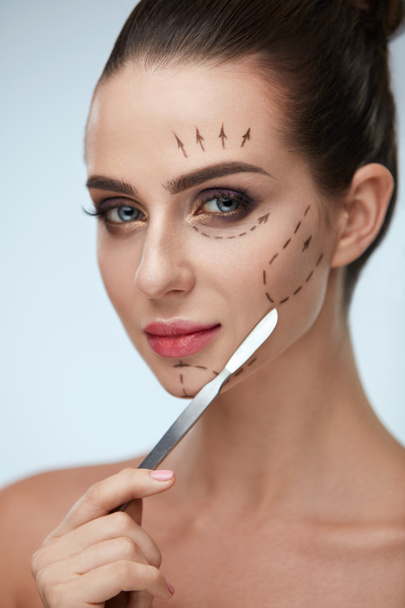 Plastic Surgery Operation. Beautiful Woman With Lines On Face - Valokuva, kuva