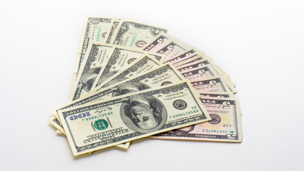 白い背景の上のアメリカのお金ドル紙幣手形 - 写真・画像