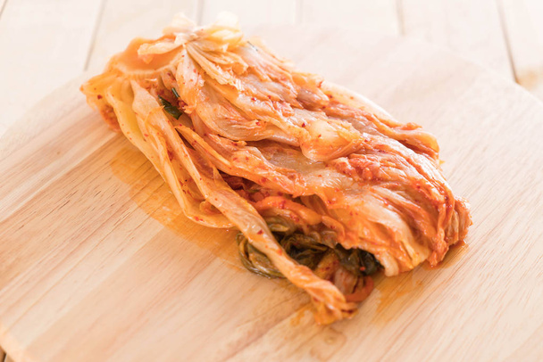kimchi on wood background - korean food - Фото, зображення