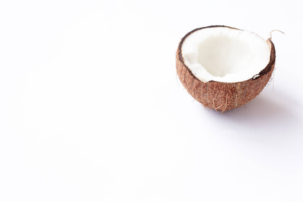 Half of coconut closeup on a white background - Photo, Image