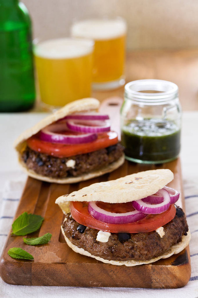 Lamb burgers with onion and tomato - Photo, Image