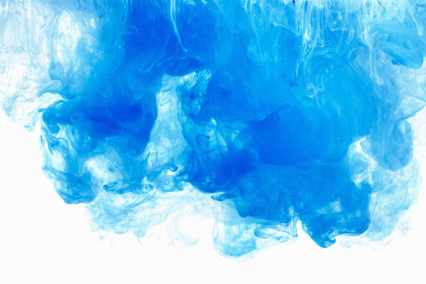 Abstract background color ink drop in water. Blue cloud of paint on white. - Photo, Image