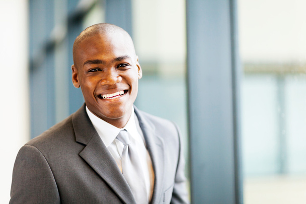 Smart african american businessman in office - Фото, изображение