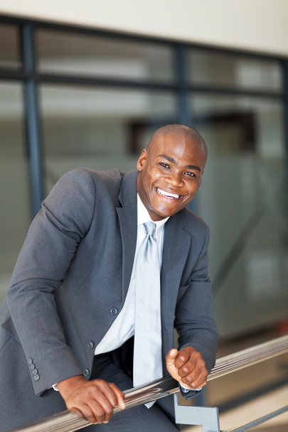 Cheerful african american businessman in office - Foto, Imagen