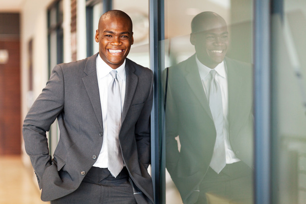 Happy african american business executive portrait in office - Photo, image