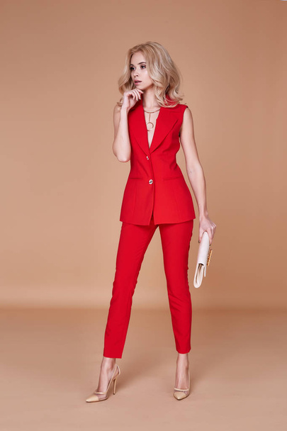 Beautiful sexy pretty girl wear red silk suit jacket and pants s - Фото, изображение