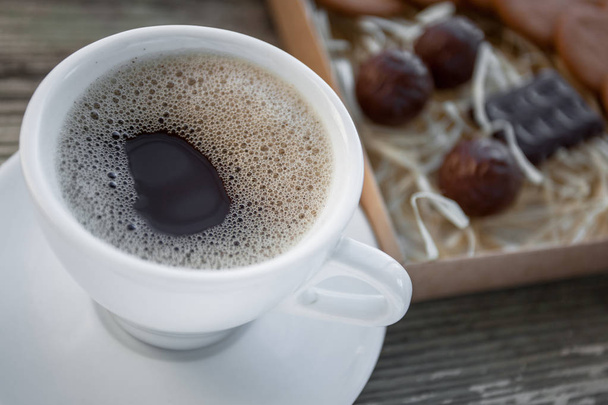 Coffee break, breakfast. Cup of coffee with biscuit cookies - Photo, Image