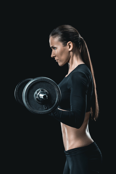 sportswoman training with barbell - Photo, Image