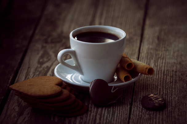 Coffee break, breakfast. Cup of coffee with biscuit cookies - Photo, Image