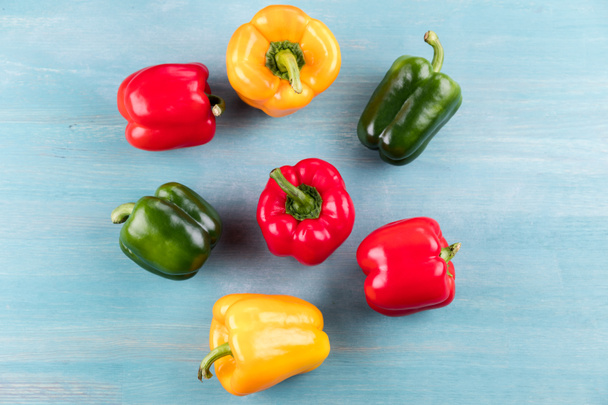 Peppers on wooden table  - Photo, Image