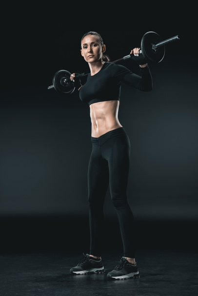 sportswoman training with barbell - Zdjęcie, obraz