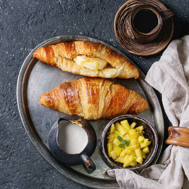 Breakfast with croissant and mango fruit - Foto, Imagen