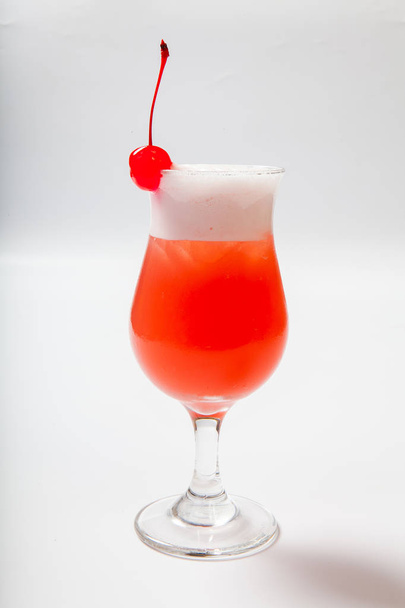 colourful coctail with cherry on the black background - Foto, afbeelding