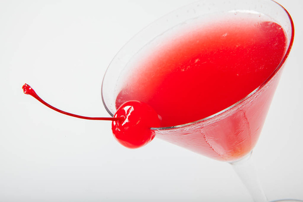 colourful coctail with cherry on the black background - 写真・画像