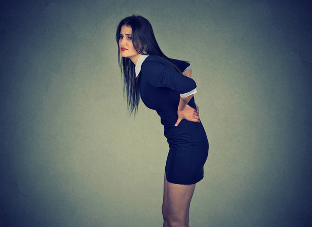 young woman with backache back pain  - Fotografie, Obrázek