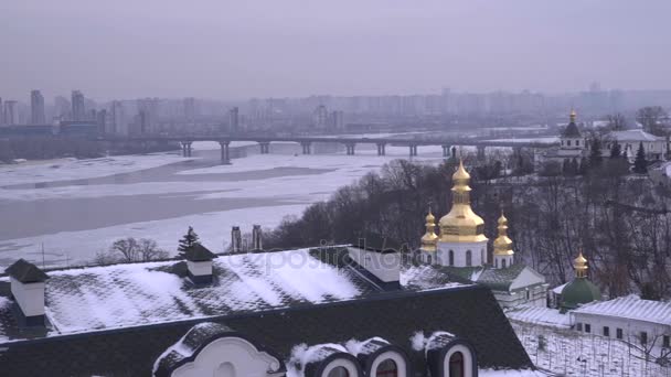 Kiev Pechersk Lavra is located on the banks of the frozen Dnieper - Footage, Video