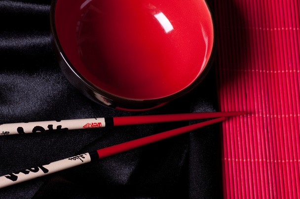 Chinese bowl and sticks - Foto, Imagen
