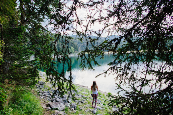 woman travel in beautiful lake and forest - Photo, Image