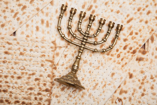 Jewish bread - matza with candlestick - menorah - 写真・画像