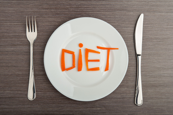 Diet concept. design food. word diet carrots on plate - Fotoğraf, Görsel