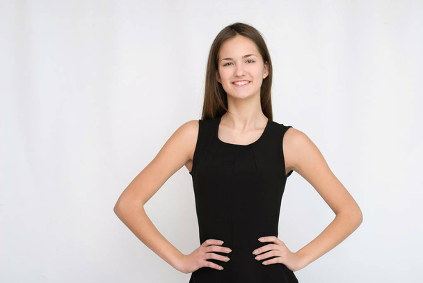 young business lady in black dress isolated - Foto, imagen