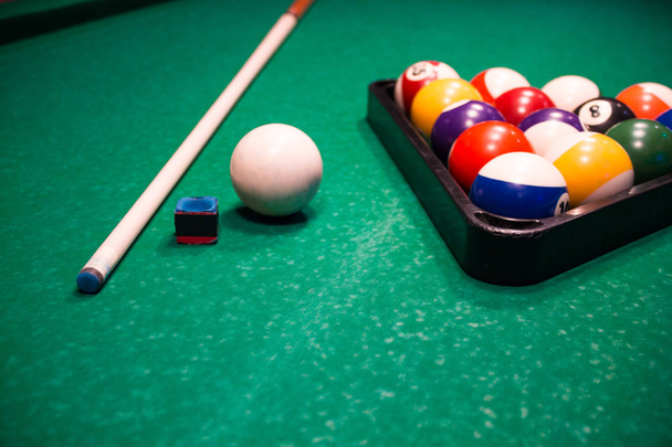 Billiard balls near by cue and chalk - Photo, Image