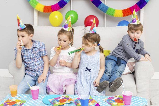 children having fun at birthday party - Фото, изображение