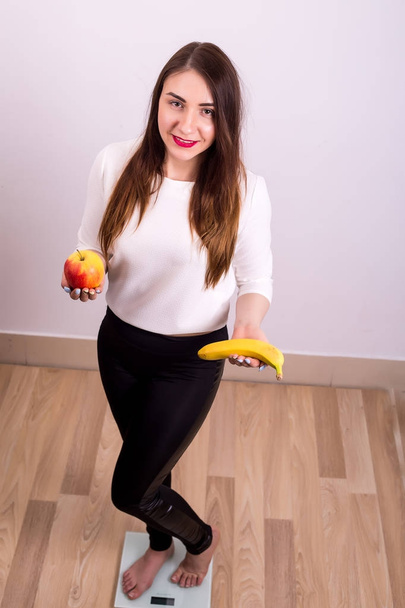 Diet Concept. Young Woman Measuring Body Weight - Fotoğraf, Görsel