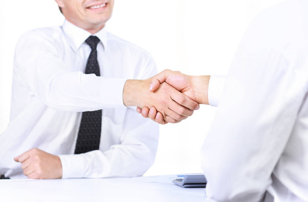 Close up image of business handshake in the meeting. Partnership concept - Фото, изображение