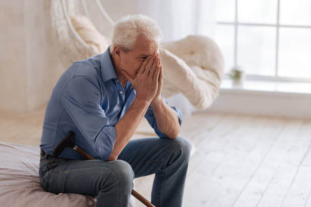Depressed aged man crying - Photo, image